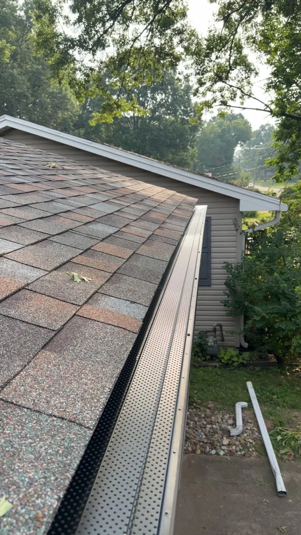 Brown gutter guard installation