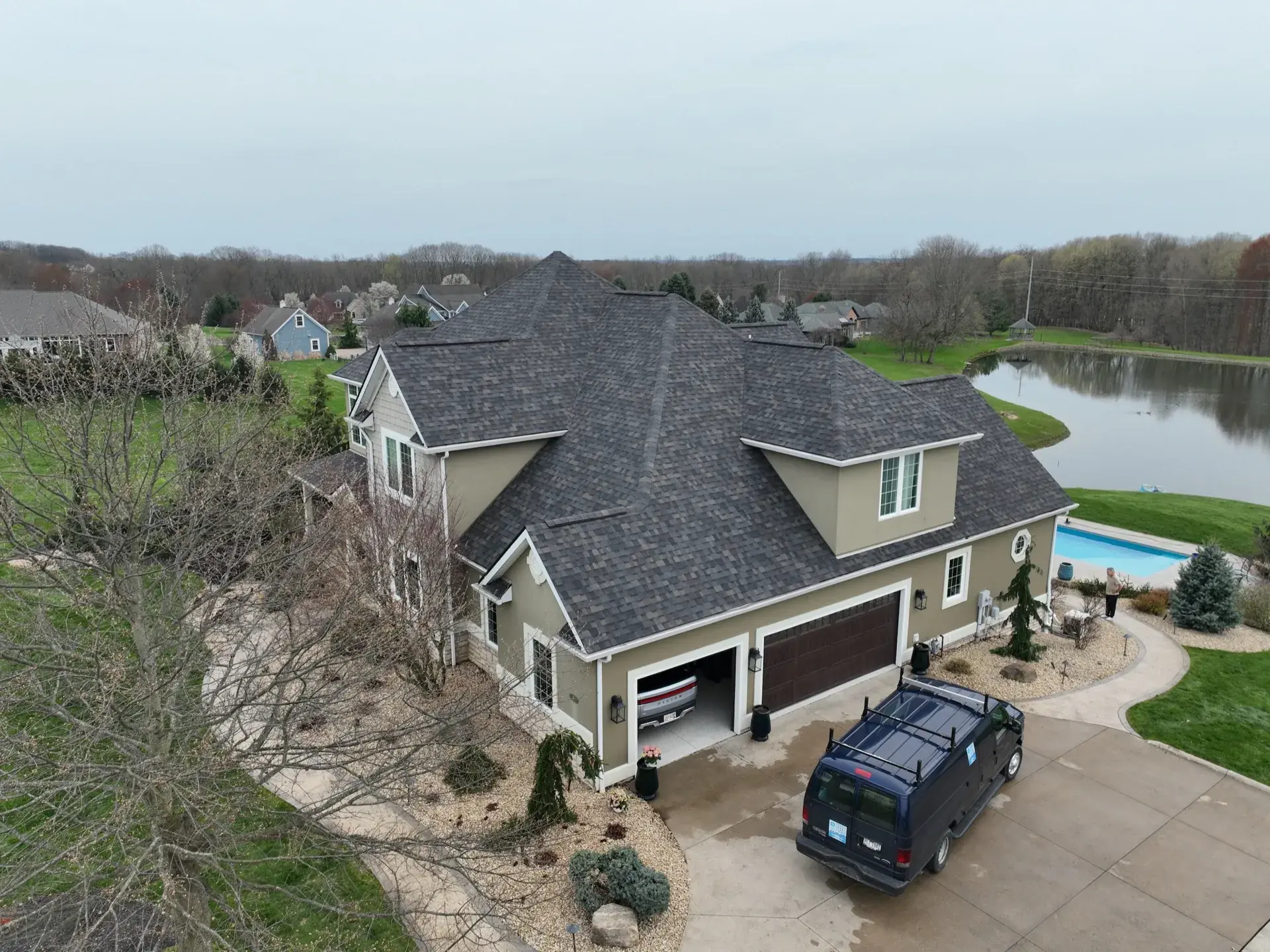 Premium estate exterior. Siding, roof, and landscape (NW Wooster lakefront)