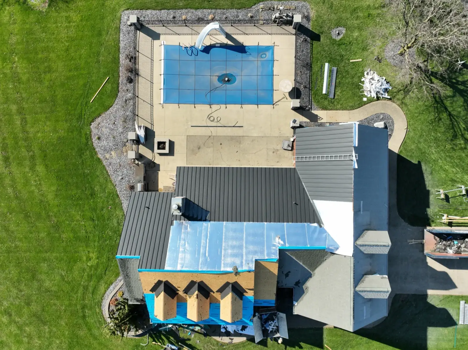 Aerial view of completed roof replacement on brick ranch home in Ravenna Ohio